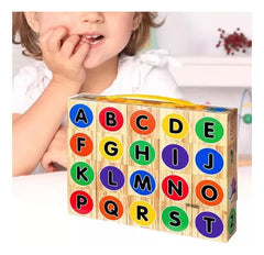 Child playing with a wooden alphabet block set available at Juniors Toys