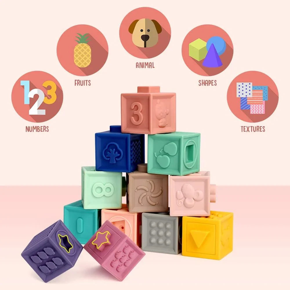 Colorful educational blocks with numbers, animals, shapes, and textures on a pink background available at Juniors Toys