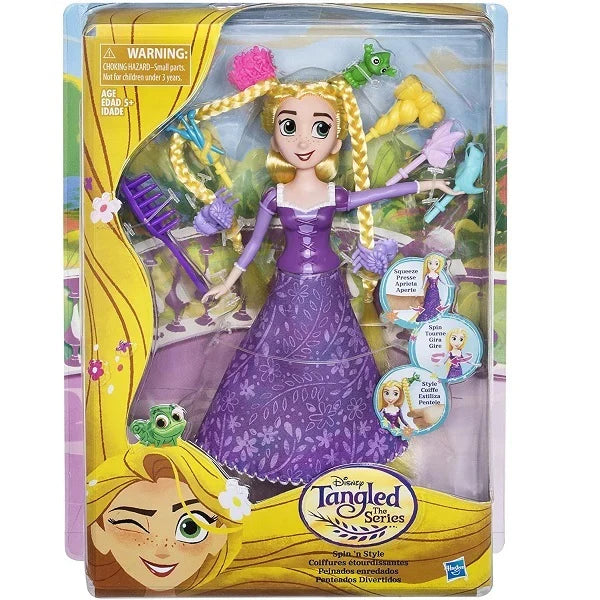 Tangled doll in packaging with yellow hair and purple dress available at Juniors Toys