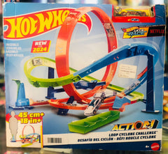 Hot Wheels Action Loop Cyclone Challenge box featuring a large orange loop and multi-colored track available at Juniors Toys