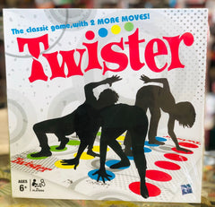 Twister game box with silhouettes of people playing availble at Juniors Toys