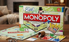 Monopoly and Ludo board games with their packaging on a table available at Juniors Toys