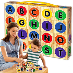 Woman and child playing with colorful letter blocks in front of a wooden box labeled 'A to Z' available at Juniors Toys
