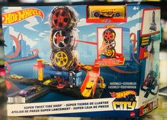 Hot Wheels City Super Twist Tire Shop toy set packaging with toy cars and track available at Juniors Toys