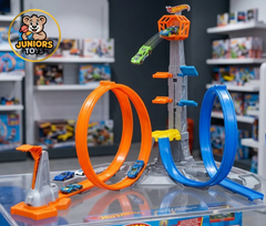 Toy track set with cars and Juniors Toys logo in a store setting available at Juniors Toys