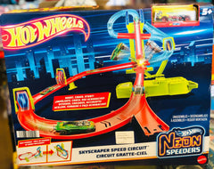 Front view of the Hot Wheels Neon Speeders Skyscraper Speed Circuit toy set box featuring a vibrant city-themed track and motorized booster available at Juniors Toys